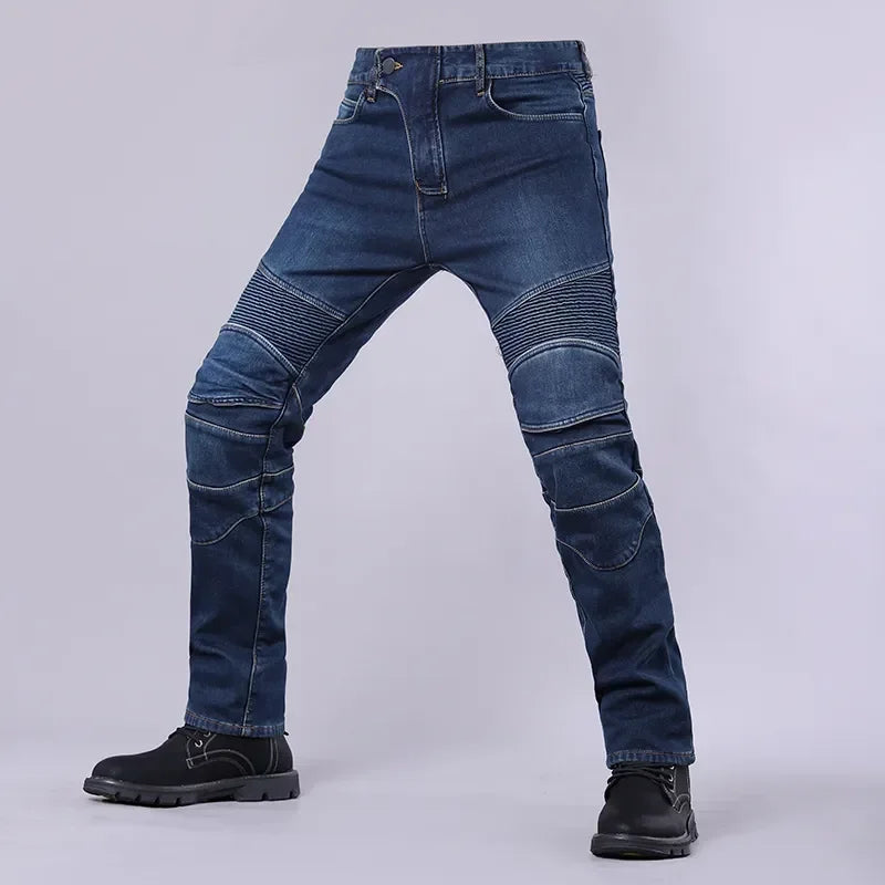 Blue jeans with protective patches on a white background
