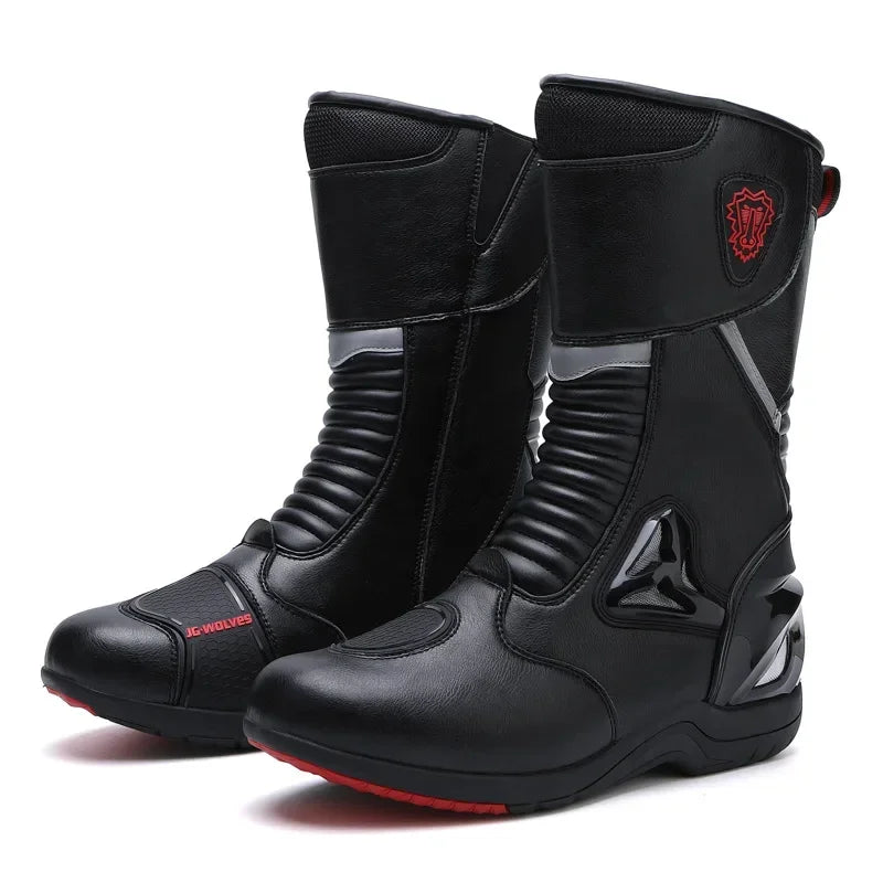 Black motorcycle boots with red accents on a white background