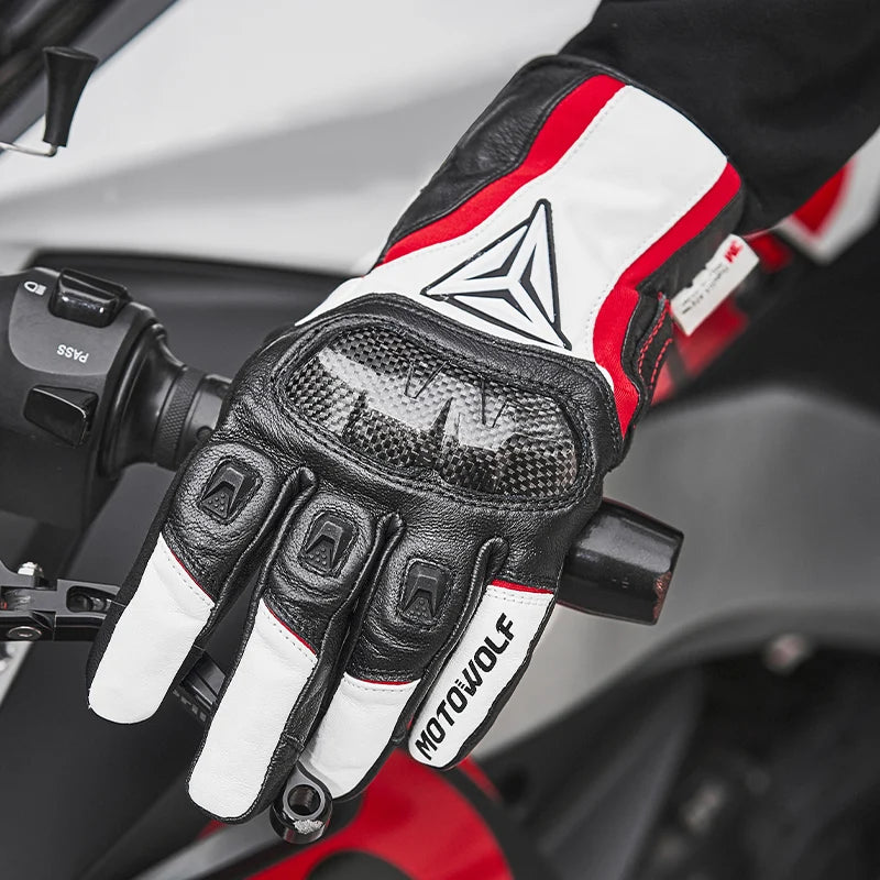 Motorcycle glove with red, black, and white design on a motorcycle handle.